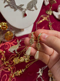 The Weeping Madonna Earrings