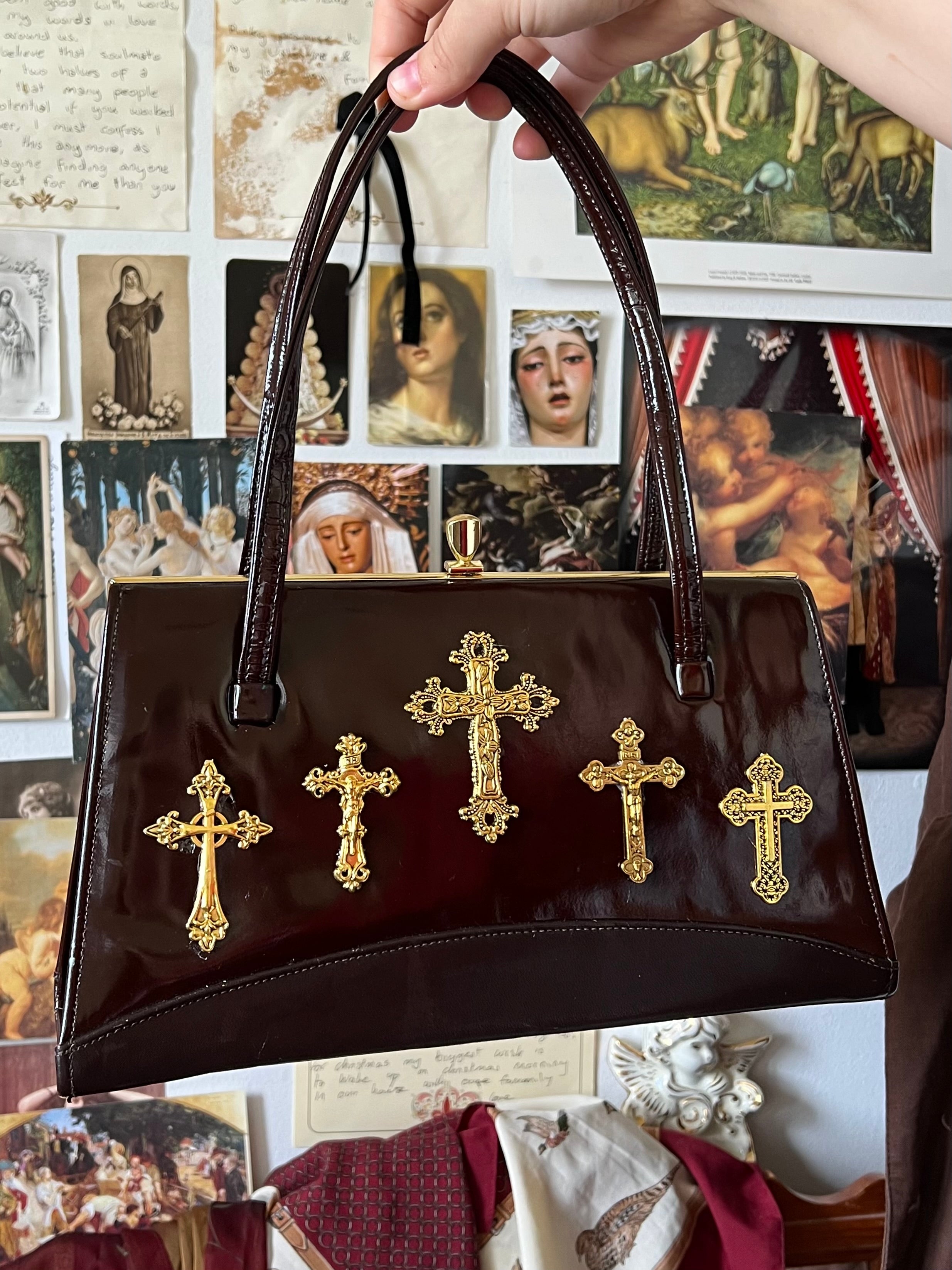 The charm of the crypt handbag