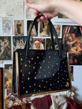 The star crossed lovers handbag
